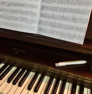 composing at the piano