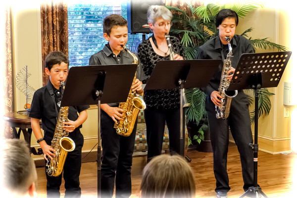 L-R: Marcus, Zach, Mary Ellen, Ally playing Dona Nobis Pacem